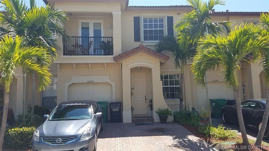 Beautiful Town Home located in sought after Tuscany Village. This home comes with Elegant  Tile Flooring thought the first floor and Wood Laminate flooring upstairs,Natural light, Custom Closets for Extra Space, Balcony, Great Back Yard for Entertaining with Custom Overhang, and Custom Office Built in. Automated Garage Door. Association fee is $102 Includes Pool Gym Playground Security Maintenance of common areas and much more!