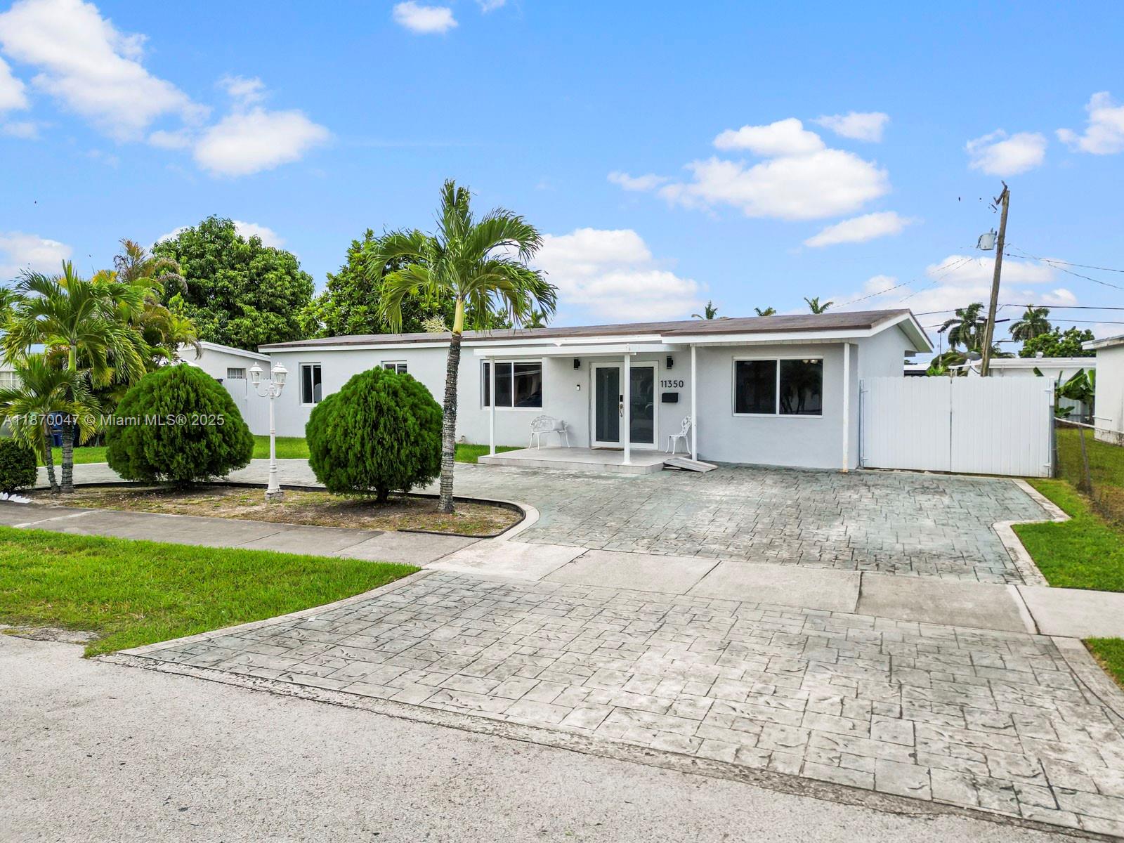 Beautifully renovated single-family home in a prime location near the Turnpike and top-rated schools. This move-in-ready property features a spacious open-concept kitchen with high-end Samsung appliances, custom blinds, and modern finishes throughout. Both kitchen and bathrooms have been fully updated.
Enjoy peace of mind with all impact windows and a large covered backyard perfect for entertaining. The home also offers a circular driveway with ample parking. Excellent location close to major highways, schools, shopping, and dining. No HOA.