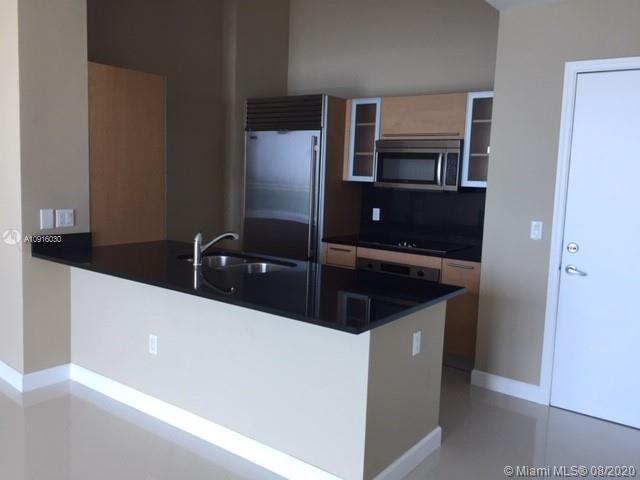 THE PLAZA 901 BRICKELL CO - Residential Lease