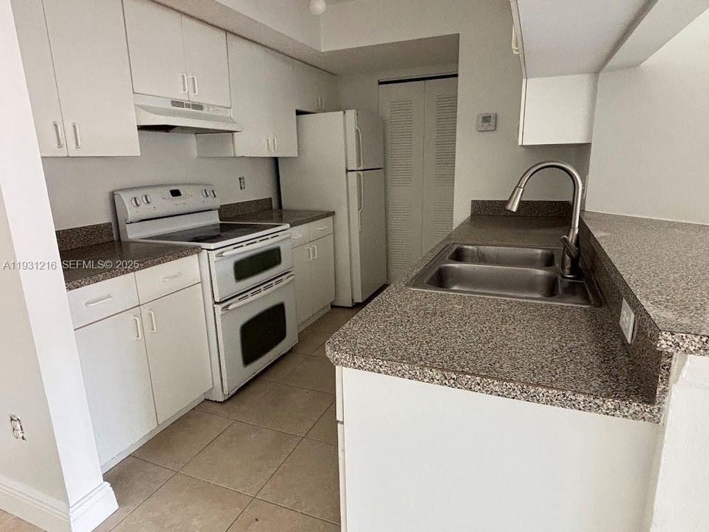 Photo of 440 S Park Rd #4-303, Hollywood, FL 33021 (MLS # A11931216)