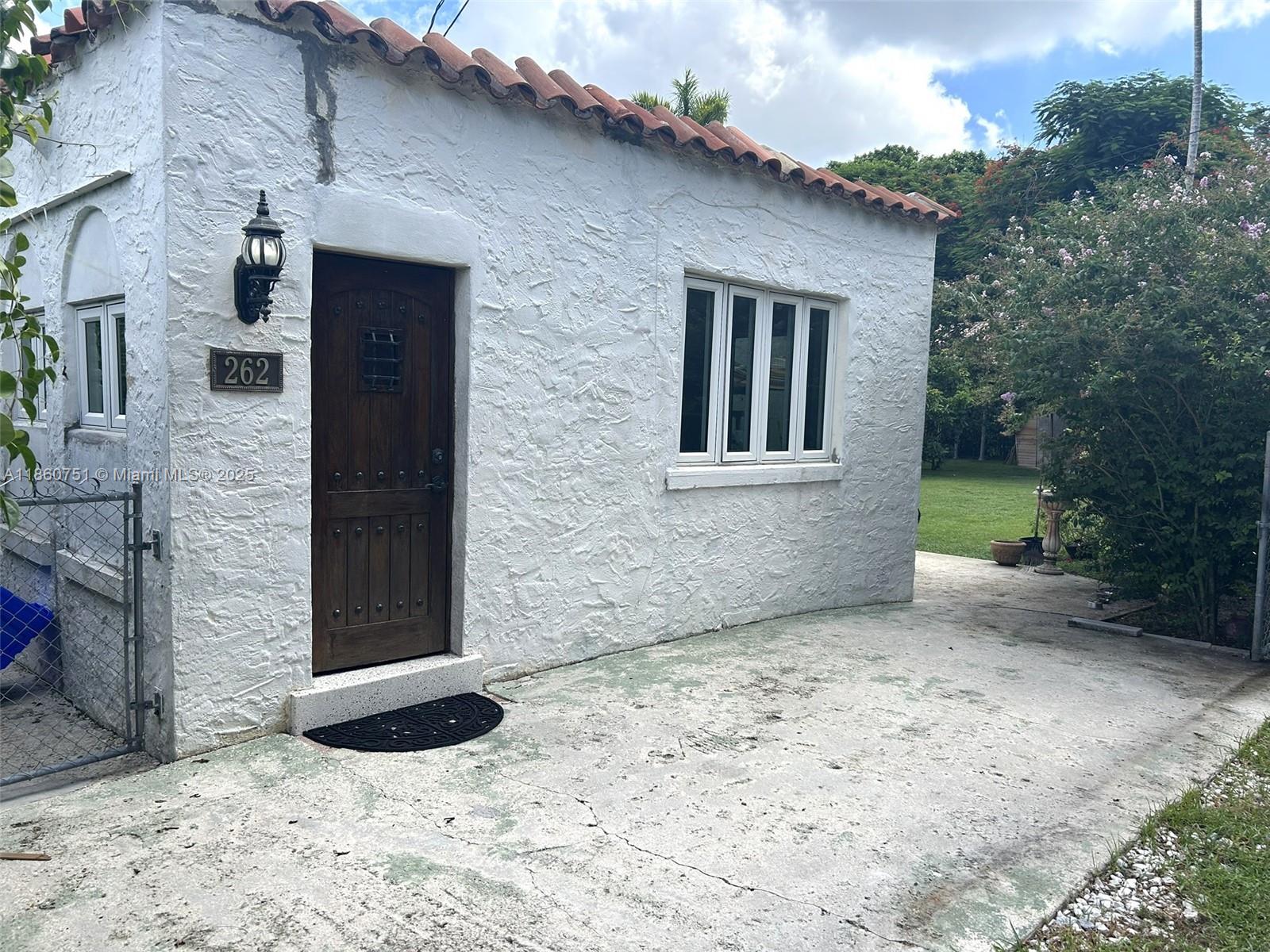 UNIQUE OPPORTUNITY TO LIVE IN THE HEART OF MIAMI SHORES VILLAGE FOR $1,800 PER MONTH. DETACHED COTTAGE APARTMENT BEHIND 1920'S HISTORICALLY DESIGNATED HOME. RENT INCLUDES ELECTRIC, WATER & INTERNET. ONE ASSIGNED PARKING SPACE. CERAMIC TILE FLOORING THROUGHOUT. UPDATED KITCHEN & BATHROOM. BRIGHT & AIRY APARTMENT. WALK TO LOCAL SHOPS, POST OFFICE, LIBRARY ETC. SUITABLE FOR ONE PERSON. OFFERS TO LEASE MUST BE ACCOMPANIED BY RECENT CREDIT REPORT WITH MINIMUM SCORE OF 630, PROOF OF INCOME, COPY OF PHOTO ID, AND LAST TWO BANK STATEMENTS. NOTE: ACCESS TO THE UNIT IS FROM THE BACK SERVICE ALLEY BEHIND THE MAIN HOUSE.