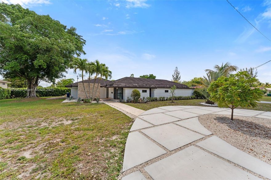 A stunning fully renovated home situated on a spacious corner lot, featuring a screened pool area in the heart of Coral Springs. The property boasts exceptionally large rooms and a spacious patio leading to an impressive swimming pool. The living room includes a modern electric fireplace adjacent to the kitchen, which is finished with top-of-the line appliances. The doors/windows are brand new and come with a lifetime warranty. Windows/Doors are accompanied with Zebra shades all throughout the home. NO HOA!! The owner has invested significantly to make this a truly remarkable home. Come visit and experience its charm firsthand!