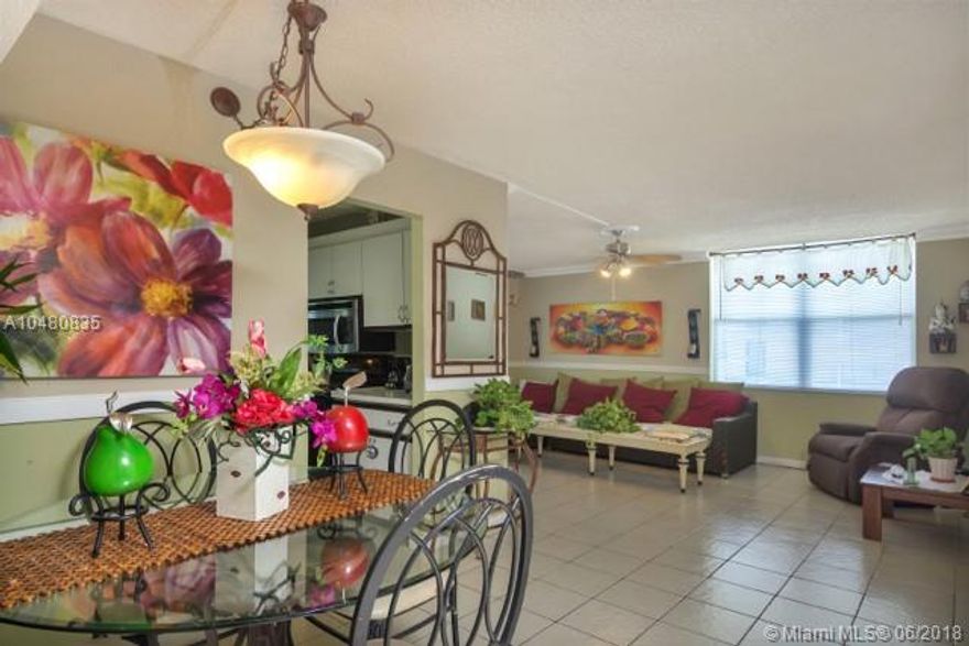 LARGE IMMACULATE CORNER UNIT WITH  TILE FLOORS THROUGHOUT ENCLOSED PATIO FOR ALL WEATHER USE CREATES ANOTHER ROOM FOR ENTERTAINING OR RELAXING.AMENITIES INCLUDE CLUB HOUSE,POOLS,TENNIS COURT, BILLIARD, EXERCISE ROOM AND MUCH MORE.RENTING PERMITTED AFTER 18 MONTHS OF OWNERSHIP.ASSOCIATION REQUIRED 700 MINIMUM CREDIT SCORE AND $22,000 ANNUAL INCOME.ASSOC STATES 55+.ALLOW SERVICE DOG UNDER 15 POUNDS