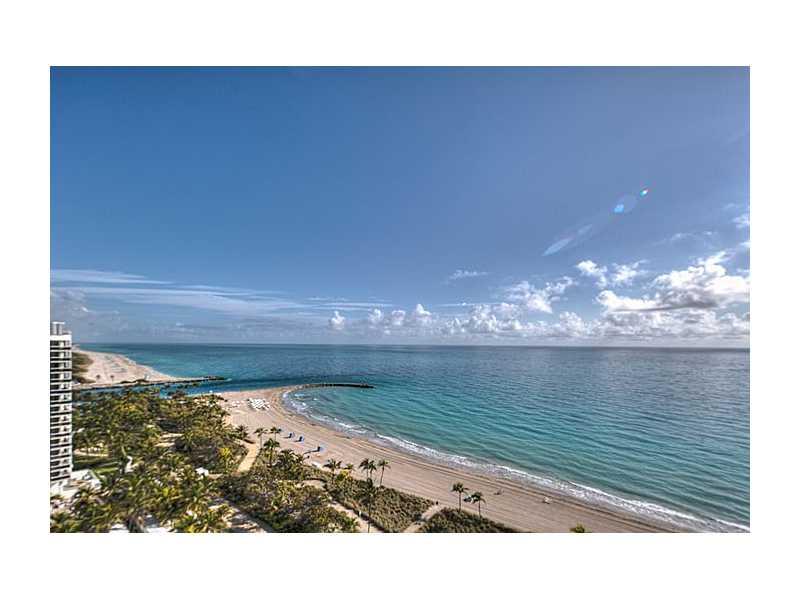 Bal Harbour NE corner oceanfront w/wraparound oversized balcony. Direct & endless ocean views. No less than perfection to this impeccably designed unit. Master w/abundance of closet space w/2 master bths connected thru glass shower & both covered in onxy (floors,counter&tub).Enormous kitchen w/ Wolf,Miele&SubZero. Den/office, butlers pantry, motorized shades & private elevator. Bellini is one of Miami's most desired buildings with a location like no other. Exudes a delicate balance of warmth & elegance.