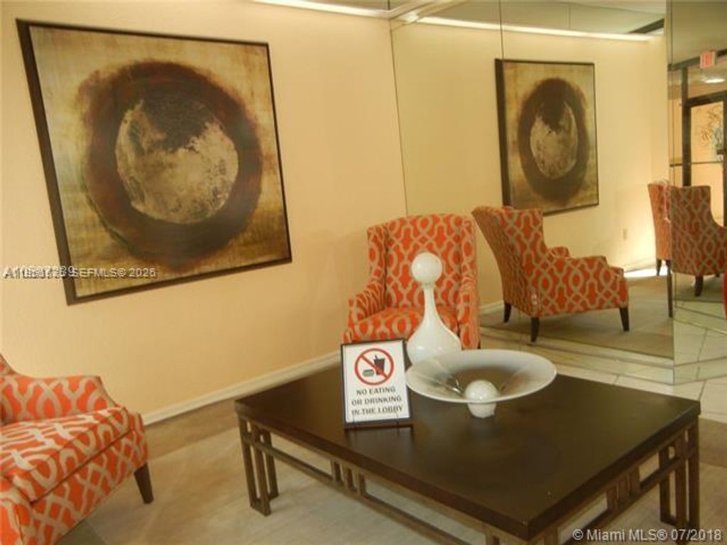 Photo of 1300 St Charles Pl #302, Pembroke Pines, FL 33026 (MLS # A11966575)