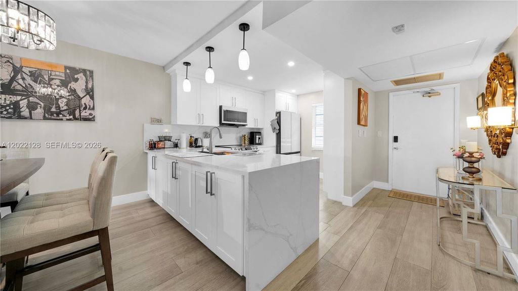 Photo of 605 Oaks Dr #502, Pompano Beach, FL 33069 (MLS # A12022128)