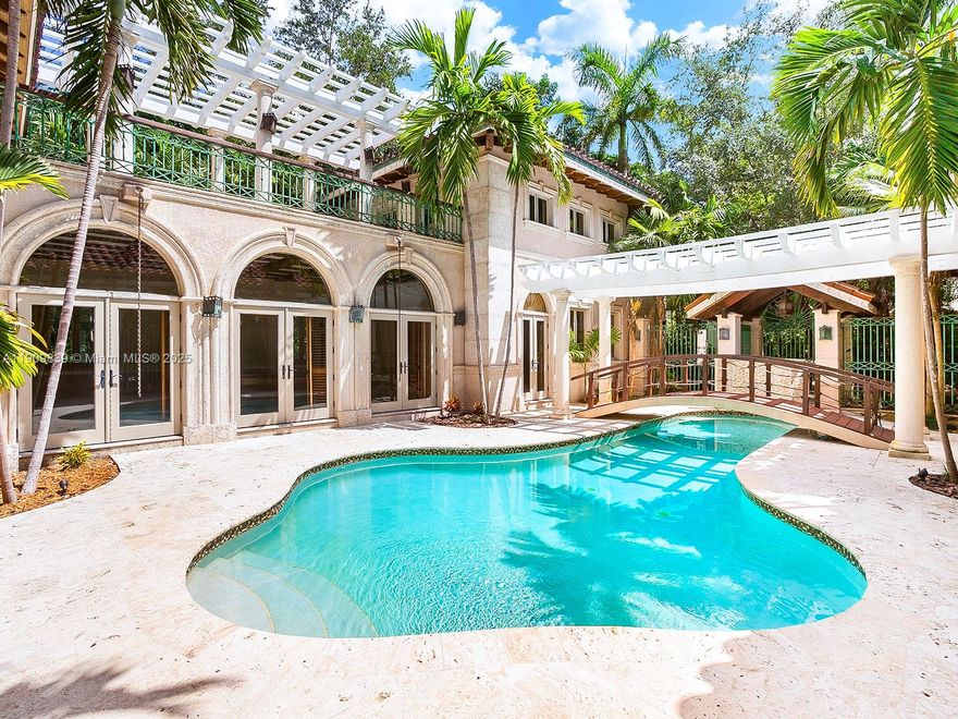 Architectural Marvel, Stunning masterpiece Villa w/beautiful finishes. Exposed hardwood beamed ceilings and coffered ceilings. Iron gates, granite floors & countertops, cocina stone floors, open breezeways, trellises, etched glass picture windows and columns. Concrete roof with w/old world clay tiles, teak plank doors & wood work. Swimming pool w/waterfall & sit down area ,2 large main bedroom suites w/second floor loft style spaces, large family room  could be a formal dining room or even a 3rd bedroom & upstairs outside terrace is fantastic for outdoor enjoyment. Separate formal spacious living room, kitchen is spacious w/island, custom etched glass, cabinetry, lots of countertop space, staff quarters, 2 car garage w/ plenty of parking in driveway.