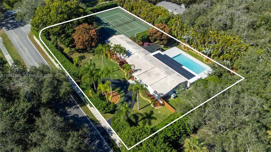 Discover this exceptional and elegant 4-bedroom, 3-bathroom residence featuring 3,250 square feet of living space on an expansive 35,066 square foot lot. Nestled in a quiet, highly sought-after neighborhood just minutes from Miami’s premier shopping destinations and top-rated schools, this remarkable property offers the perfect blend of comfort, sophistication, and convenience.
The outdoor space is designed for both relaxation and entertaining, showcasing a resurfaced private tennis court, a large swimming pool, a welcoming outdoor bar, and a covered dining patio ideal for gatherings year-round.
Inside, the home features generous living areas and a thoughtfully designed modern layout that promotes effortless everyday living. Energy-efficient solar panels add both sustainability and cost savings.
Properties of this caliber are rarely available. Schedule your private showing today.