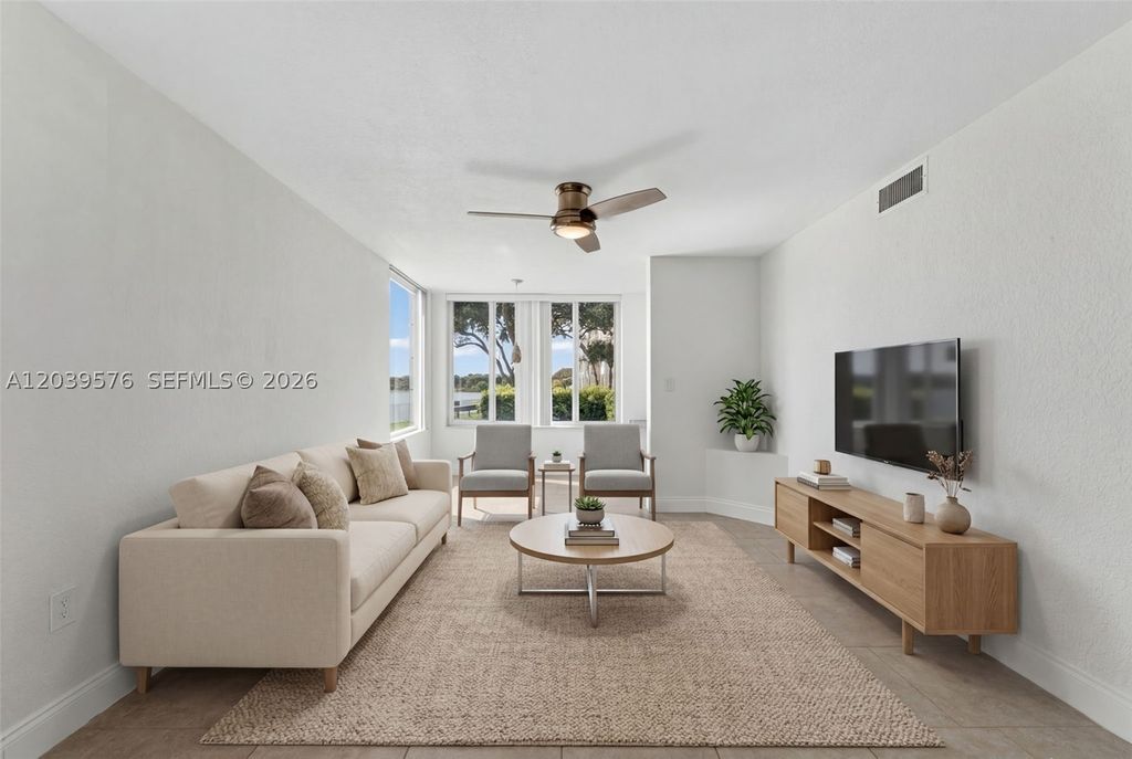 Photo of 2841 N Oakland Forest Dr #110, Oakland Park, FL 33309 (MLS # A12039576)