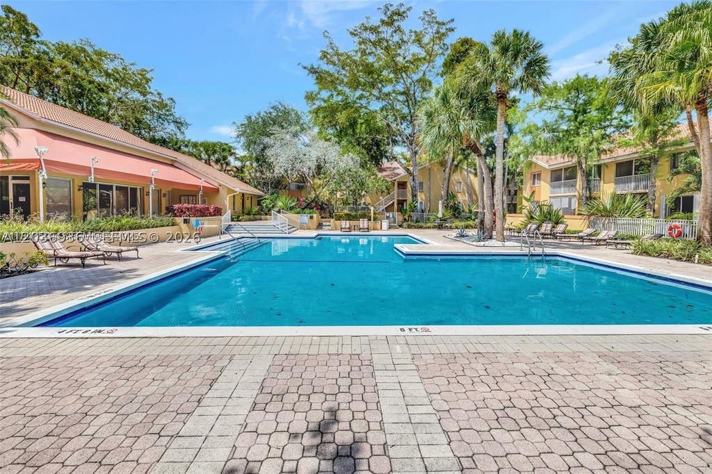 Photo of 937 Coral Club Dr #937, Coral Springs, FL 33071 (MLS # A12036936)