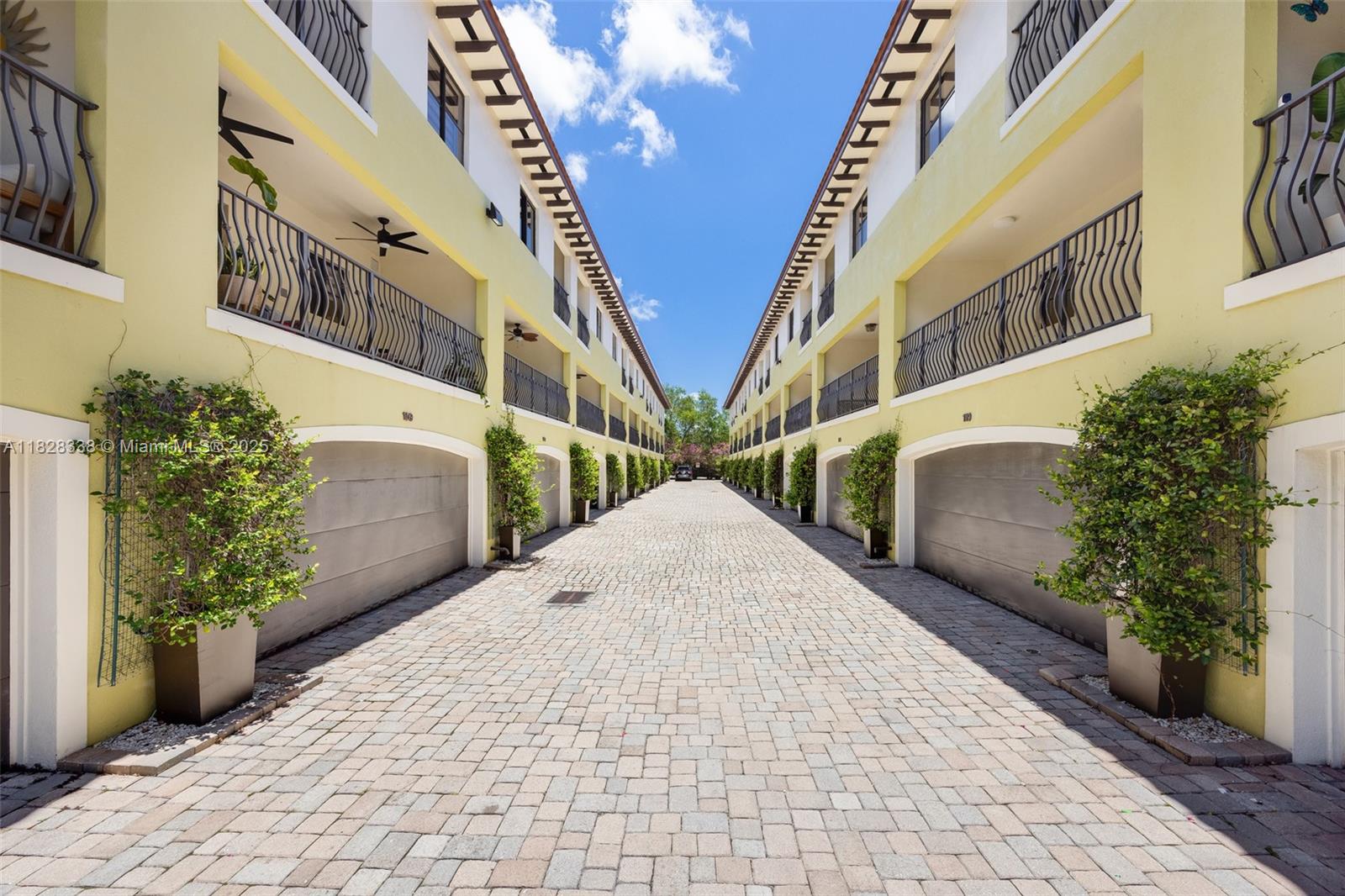 Beautiful tri-level townhome in a gated community in the heart of Coconut Grove. Features include travertine marble floors, open kitchen with wood cabinets, granite counters, and stainless-steel appliances. Flexible layout with 3 bedrooms—each with a private bath—plus 2 full and 2 half baths. Private tropical courtyard, balconies on every floor, and 2-car garage. Prime location near Brickell, Downtown, Coral Gables, and just a short walk or bike ride to Coconut Grove’s dining, shops, and parks.