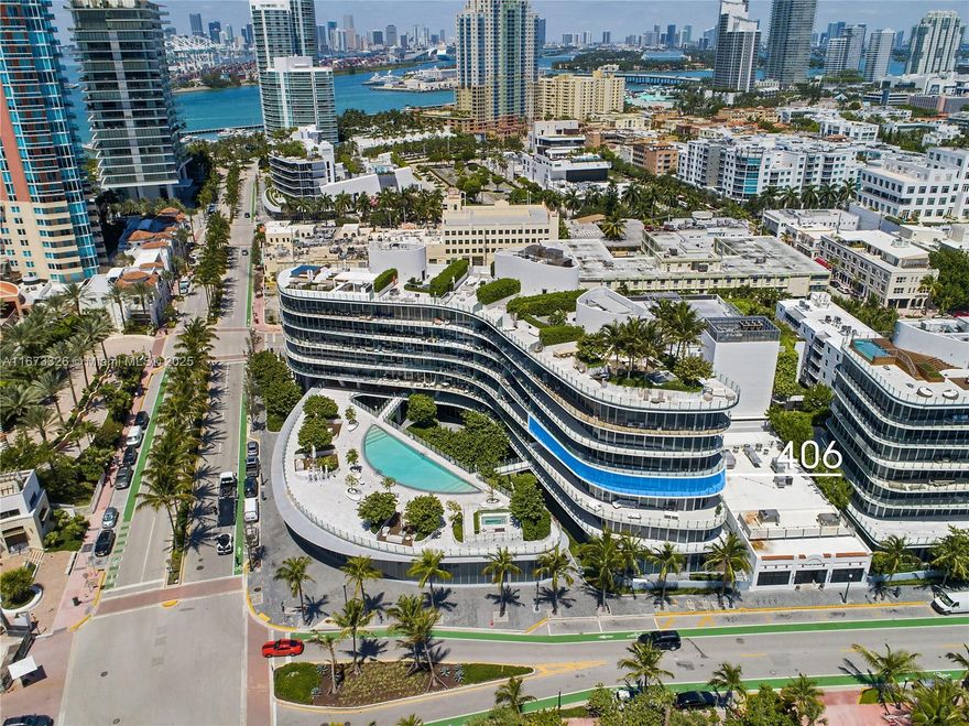 Discover our luxury boutique residence near the beach in prestigious South of Fifth, designed by Aster. This fully furnished home features private elevator access, 4 bedrooms with ensuite bathrooms, a powder room, and 3,337 square feet of living area, plus 1,000 square feet of wraparound terrace.
The chef's kitchen boasts a custom European design, Sub-Zero refrigerator, wine cooler, Wolf appliances, gas range, marble island, and wet bar. The master suite features a walk-in closet and a luxury bathroom with a floating tub. This smart home has new air conditioning units with a UV system for better air quality.
It offers a private 2-car garage, valet service, and is part of an elite building with only 50 residences, designed by Enrique Norten with landscaping by Enzo Enea.