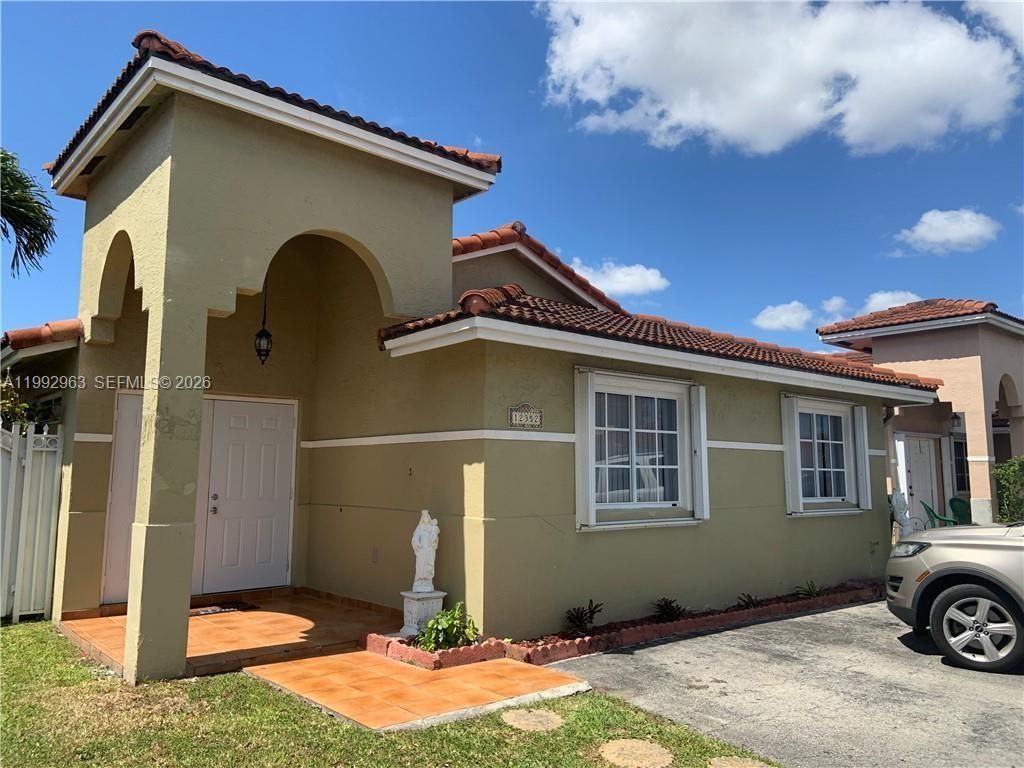Photo of 12352 NW 98th Ave, Hialeah Gardens, FL 33018 (MLS # A11992963)