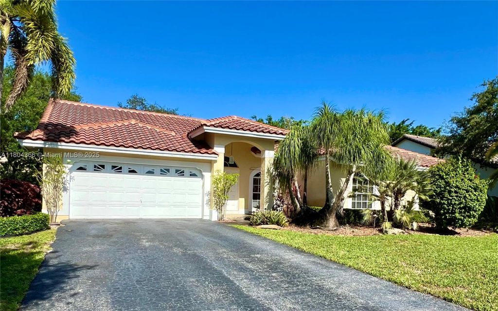 Photo of 5407 NW 107th Ave, Coral Springs, FL 33076 (MLS # A11804366)