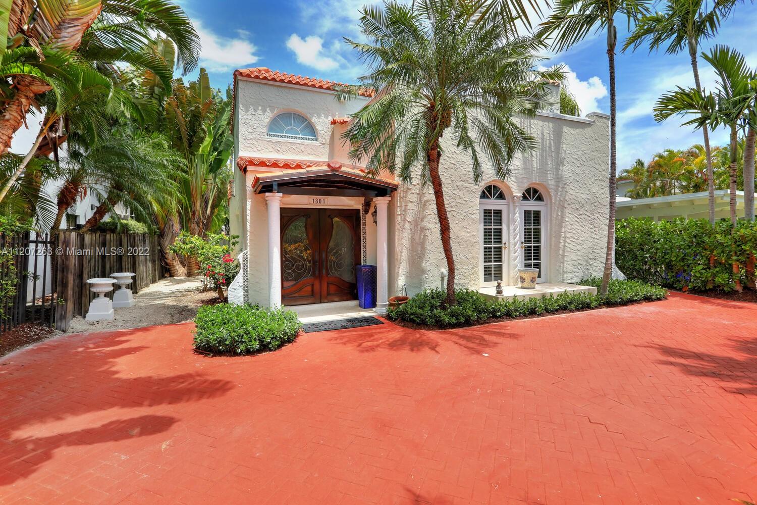 Lovely home on a quiet cul-de-sac street in North Coconut Grove. Meticulously restored & updated (All impact glass). Elegant, light-filled living room w/12 ft. high beamed ceilings, wood flooring & fireplace. Chef’s kitchen features wood cabinetry, stone countertops and a commercial-style gas range. Main house has 3BR’s/2BA’s + formal living & dining room, as well as a breakfast room. 2nd level master suite offers a sitting area and a large bath w/ frameless glass shower & soaking tub. A walled & ultra-private courtyard w/pool and outdoor bar area, ideal for entertaining. 2-story guest house features living area + 1BR/1.5BA’s. Walk or bike to bayfront parks, marinas and to the Grove village’s galleries, boutiques & cafes. Minutes to downtown, MIA, Brickell, Key Biscayne & the Beaches.