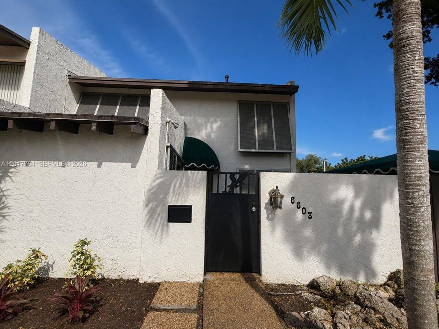 Beautifully renovated and move-in ready corner unit townhouse located in the highly desirable Kendall area, west of US-1. This spacious 3-bedroom, 2-bathroom home features an updated interior, functional layout, abundant natural light, and added privacy as a corner unit. Enjoy a private outdoor area perfect for relaxing or entertaining. Situated in a quiet and well-maintained community with low association fees that covers landscaping and paint . Community amenities include a pool, cabana clubhouse, tennis courts, and basketball court. Conveniently close to top-rated schools, shopping centers, restaurants, parks, and major highways. Excellent opportunity for both end-users and investors.