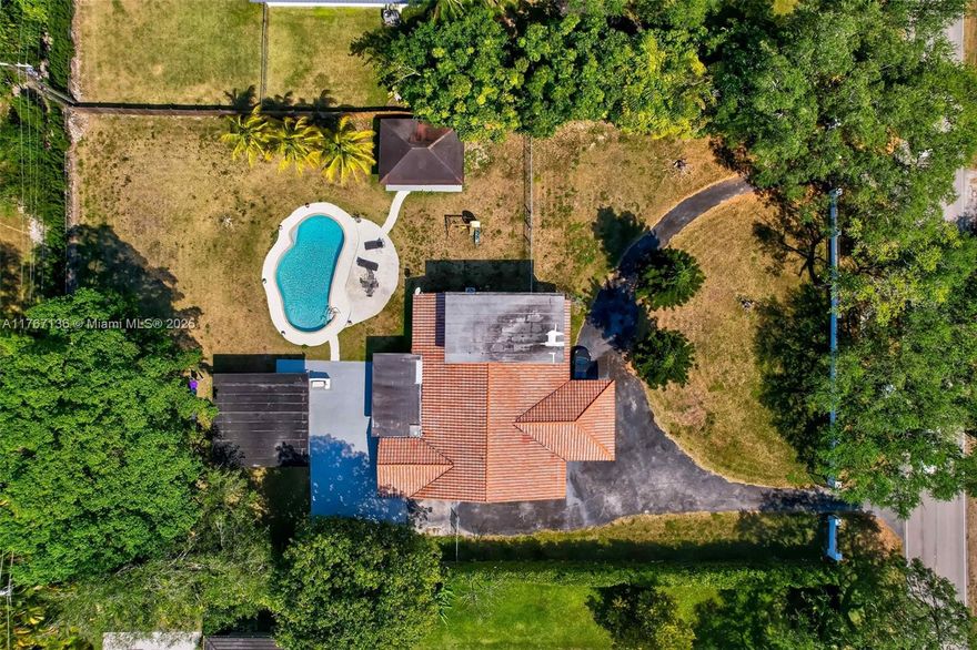 Seize this exceptional opportunity to craft your dream estate on a spacious 37,897 sq ft lot (just under 1 acre) in the coveted Pinecrest community. Nestled in North Pinecrest, this expansive property offers endless possibilities for creating a bespoke home tailored to your vision, blending luxury with the area’s signature tranquility. Renowned for its elegant residences, top-tier schools, and welcoming vibe, this location delivers the perfect balance of seclusion and convenience. Enveloped by lush, established greenery, the lot promises a private retreat while remaining moments away from premier amenities, including exceptional dining, boutique shopping, scenic parks, and recreational hotspots. Act now to secure your place in one of Miami’s most sought-after enclaves.