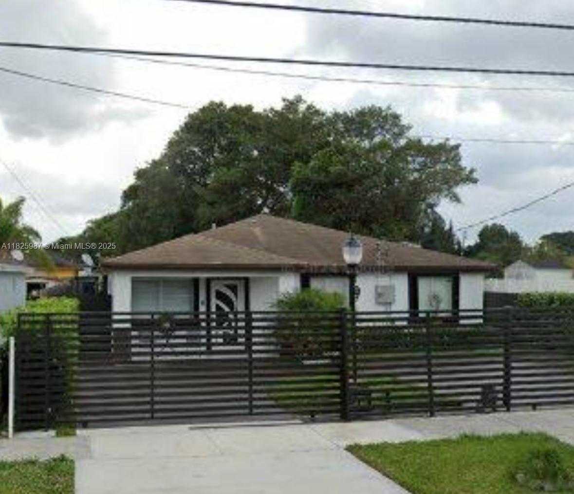 This 4/2 offers a backyard paradise with above ground pool and gated driveway.