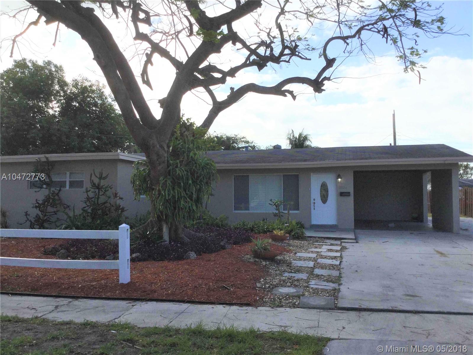 This beautiful 3 bedroom 2 bath, 2,000 sf home is located in Fort Lauderdale, FL. This home features beautiful tile , an updated kitchen with stainless steel appliances, spacious dining area and car port. Private back patio with fully fenced in yard, great for pets and outdoor entertaining.