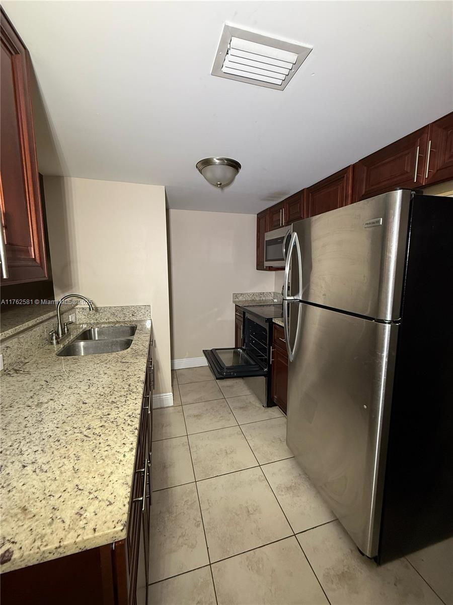 1990 Nw 4th Ct 7, Miami, Broward County, Florida - 3 Bedrooms  
2 Bathrooms - 