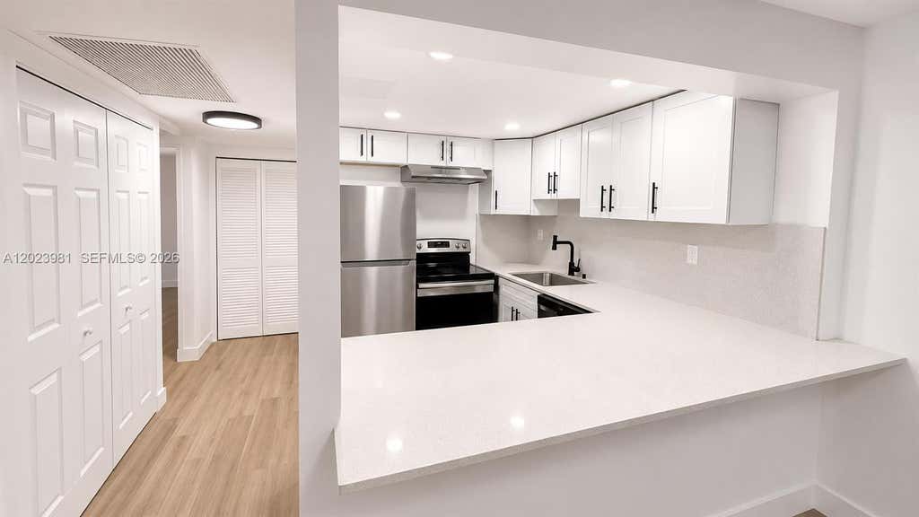 Photo of 5845 Washington St #65, Hollywood, FL 33023 (MLS # A12023981)