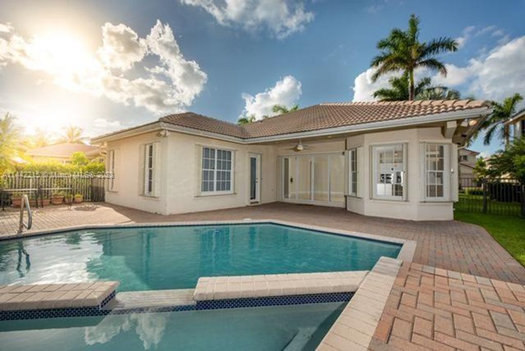 Photo of 1737 Harbor View Cir, Weston, FL 33327 (MLS # A11442215)