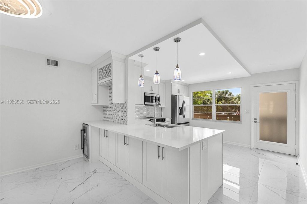 Photo of 2303 Lucaya Ln #H2, Coconut Creek, FL 33066 (MLS # A11983536)