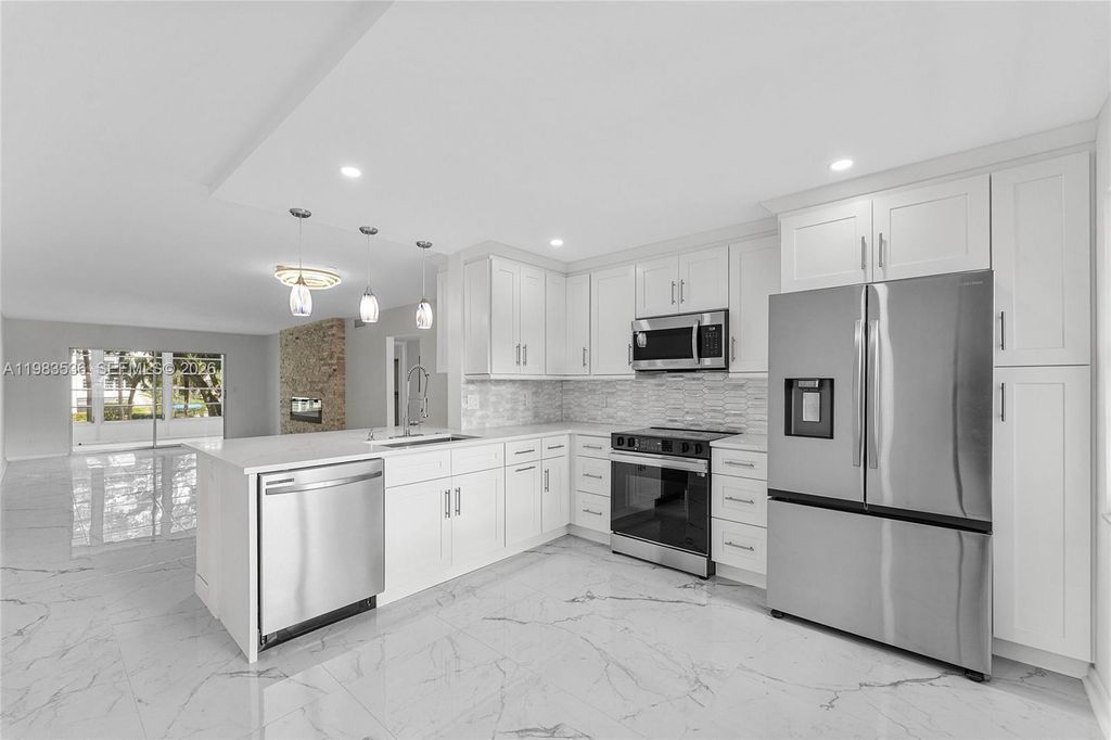 Photo of 2303 Lucaya Ln #H2, Coconut Creek, FL 33066 (MLS # A11983536)