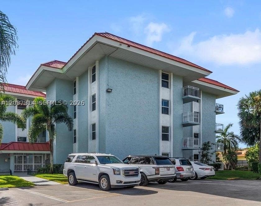Photo of 605 S Pine Island Rd #404A, Plantation, FL 33324 (MLS # A12037314)