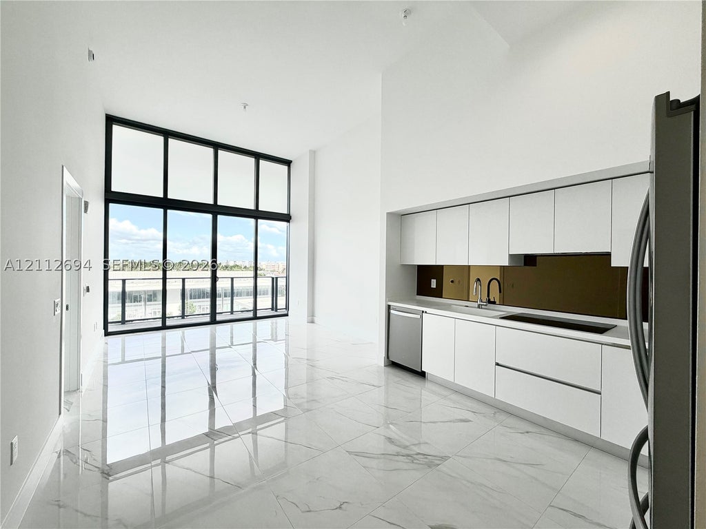 Photo of 1170 E Hallandale Beach Blvd #503, Hallandale Beach, FL 33009 (MLS # A12112694)