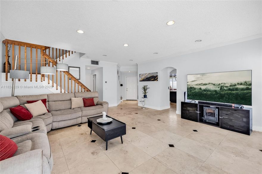 Welcome to The Cornerstone Retreat! This beautifully updated 3 bed-2.5 bath corner-lot Chapel Trail home offers comfort, style, and modern upgrades. Step into the spacious open-flow floor plan with large great room leading to a smartly updated eat-in kitchen with granite countertops, a breakfast bar, and stainless-steel appliances. The expansive dining room opens through French doors to a private patio oasis, complete with travertine pavers and privacy fencing—low maintenance and perfect for entertaining with family and friends! Guest powder room downstairs, with all bedrooms quietly situated upstairs, including the main ensuite with walk-in closet and double-vanity bath. Great features and amenities: two-car garage, low HOA, and a fantastic community pool. A great value and MUST SEE home!