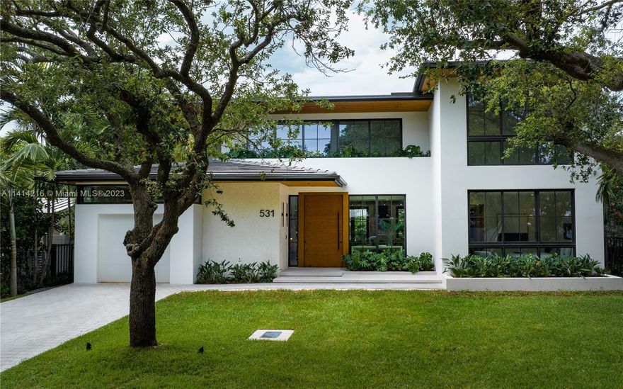 Welcome home to 531 NE 52nd St – a brand new spec home, where luxury and relaxation meet. Located in Morningside, a highly desirable gated community, this 6-bedroom, 5-bathroom house is a true gem. With 4480 square feet of living space and 5230 of total square feet. Home features 9-ft wooden pivot front door, 22-foot living ceiling height, solar ready, custom Italian kitchen & doors, sliding impact windows, chef hood, double kitchen sink, wine cooler, breakfast nook with custom seating, waterfall kitchen, wooden floating stairs, prewired sound system, stone walled bathrooms, large format porcelain tiles, cabana bath, pool with 10 variations of lighting, built out BBQ, native buttonwood and oak trees and landscape lighting. Please contact listing agent for more information.