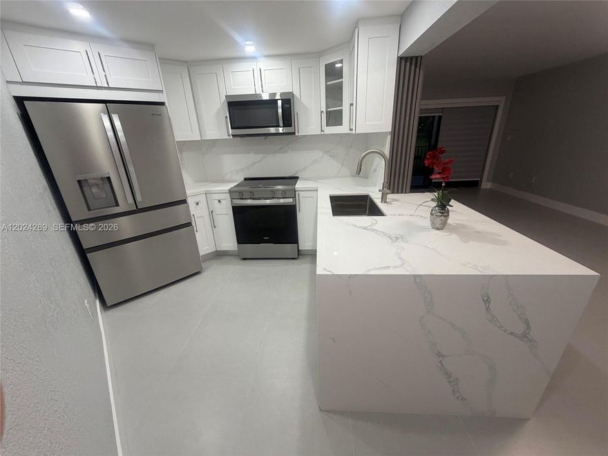 FULLY REMODELED BRAND-NEW WATERFRONT UNIT... NO PETS....
Be the first to move into this Spacious 2/2 on the first floor in the desirable West Fontaine in Fontainebleau. Completely remodeled...Huge walk-in closet, beautiful bathrooms with glass shower doors, new kitchen cabinets with modern quartz counter tops, waterfall & full backsplash. Impact windows & doors, new AC unit. Completely tiled with the same tile throughout. Come see this beauty for yourself.
Easy to see call me for an appointment. Owner agent...