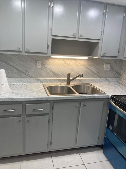 Tiny photo for 3000 NE 16th Ave #405, Oakland Park, FL 33334 (MLS # A12011772)