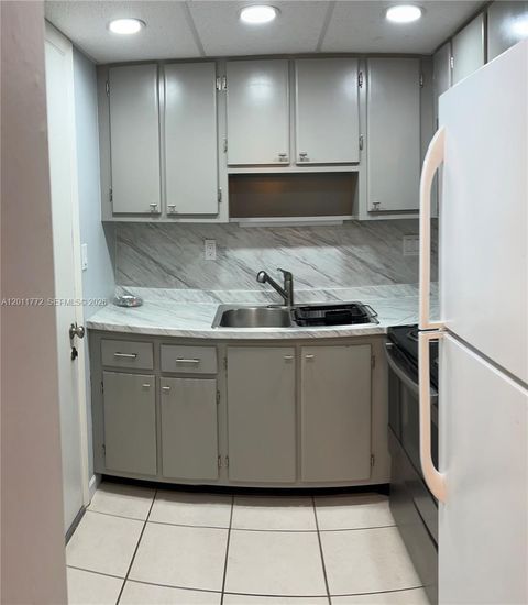 Tiny photo for 3000 NE 16th Ave #405, Oakland Park, FL 33334 (MLS # A12011772)