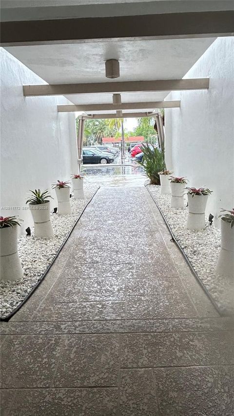 Photo of 3000 NE 16th Ave #405, Oakland Park, FL 33334 (MLS # A12011772)