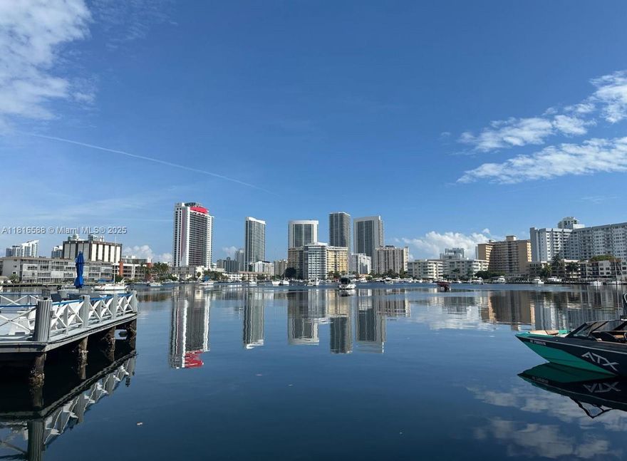 Investor Alert! This updated 2/2 corner unit is currently rented and ready to generate income from day one. Prime location just 1 mile from the beach & close to shopping and tons of restaurants, this updated condo is ready to go with impact glass, new HVAC & water heater. Private balcony with water views, saltwater pool, and community dock. HOA allows rentals after 3 years ownership, 1x per year, min 6 months. 15% rental cap in place with a waiting list—this unit already qualifies. Fully funded building with new roof & completed 40-year cert. A solid long-term hold in desirable Hallandale Beach!