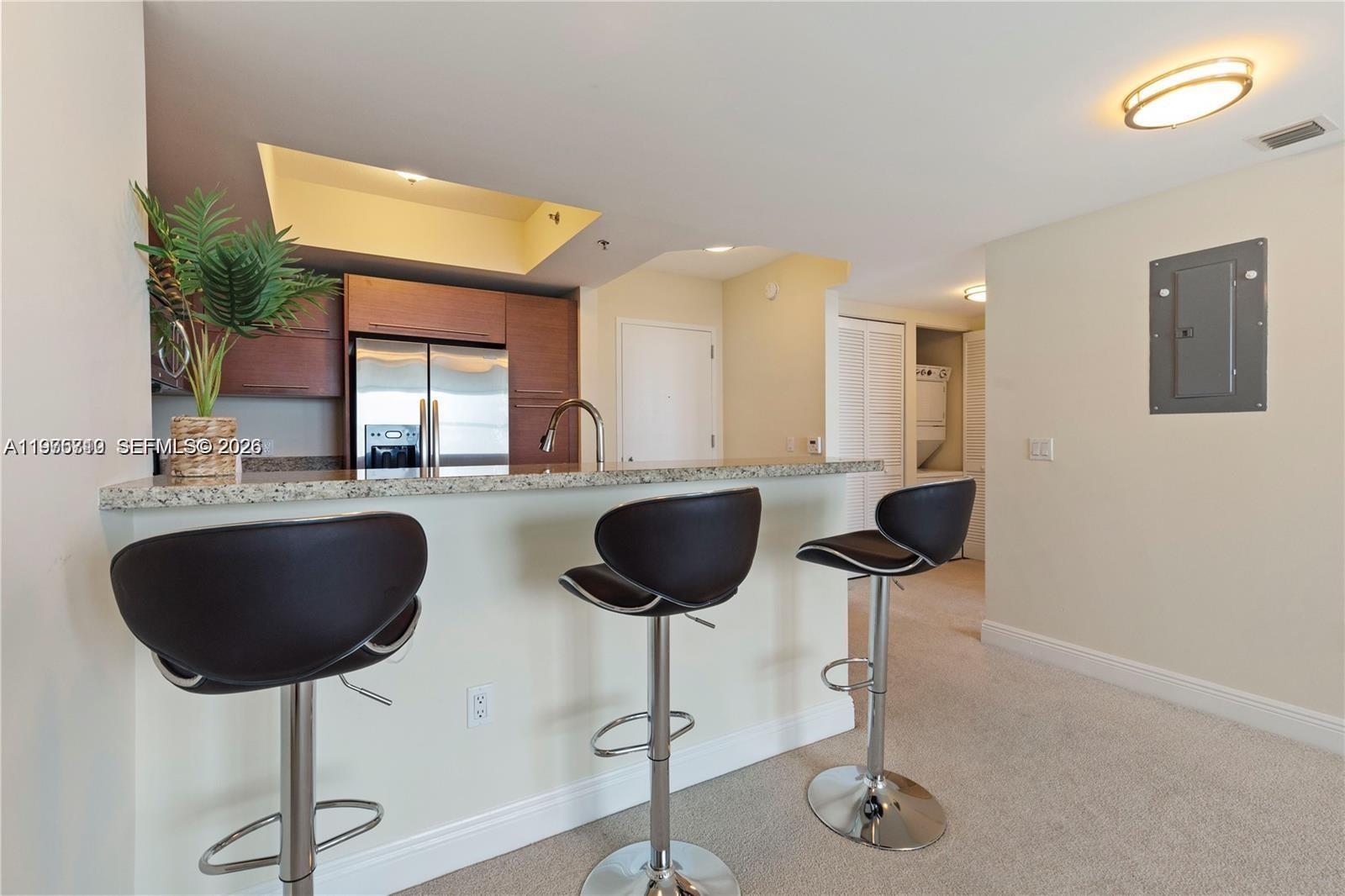 TAO SAWGRASS CONDOMINIUM - Residential Lease