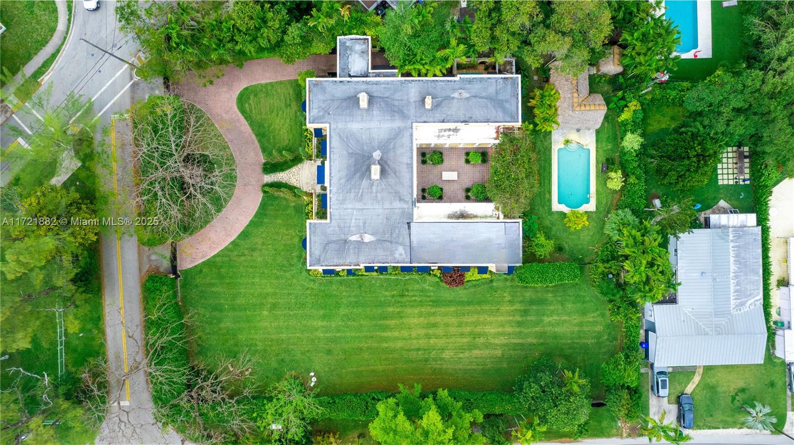 ONCE IN A GENERATION MIAMI MANSION IN A PRIME LOCATION WITH TIMELESS ELEGANCE. This exceptional property is unlike any other home you will see for sale locally. The property is a quadruple CORNER LOT that is situated on a massive 38,323sf of private & full gated Land. This Mansion features Dramatic Architecture modeled after an Estate in Pompeii Italy with 6 Bedrooms, 4 bathrooms & 8,082 Total Square Feet. The layout is complimented by Tall Privacy Gates, a Circular Driveway , Volume Ceilings , Mature Landscaping, Antique Wood Hand Painted Exposed Beams, Multiple Stone Fireplaces, Tall Arched Windows, 1920s Historical Kitchen, Stone / Wood Flooring, A Deep Courtyard, Resort Style Pool, Summer Kitchen, Rich Natural Materials & a Grass Field. Experience the Charm. Schedule a Showing