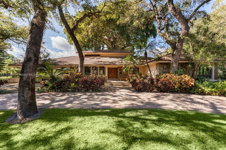 Discover Journey’s End, a prestigious private and guard-gated enclave in Coral Gables near Matheson Hammock Park. This exclusive waterfront community offers just 18 estate homes on one to two-acre lots, blending modern luxury with rich architectural history. Within this coveted setting, a 1.5-acre property awaits, surrounded by majestic banyan and oak trees for ultimate privacy. This rare offering includes a 40’ boat slip with direct Biscayne Bay access without bridges and exclusive community tennis and pickleball courts. A unique chance to build or remodel your dream estate in one of South Florida’s most secluded and sought-after neighborhoods. Near Elite Private and Public Schools.
