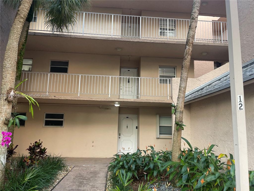 Photo of 9481 Evergreen Pl #205, Davie, FL 33324 (MLS # A11946034)