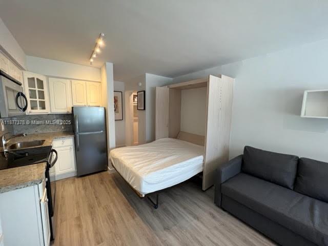 FRENCH LEAVE WEST CONDO - Residential Lease