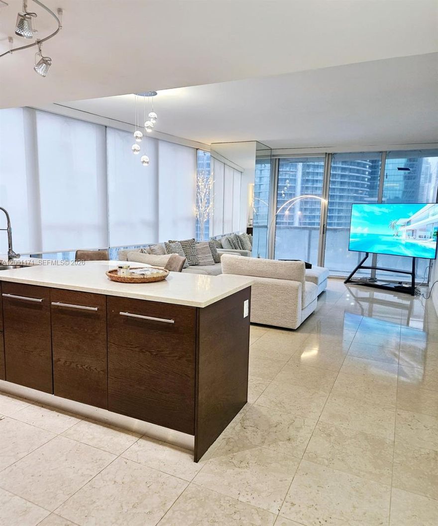 Stunning 2-Bedroom, 2-Bathroom  Furnished Luxury Condo for Rent at Icon Brickell Tower I 
This beautifully furnished corner residence offers 2 bedrooms and 2 bathrooms, thoughtfully designed to combine comfort, style, and functionality.

Positioned to maximize natural light, the unit features floor-to-ceiling windows with multiple exposures, framing serene views of the Miami River and the passing boats below. The open-concept layout creates a seamless flow between living and dining areas, making the space feel both expansive and inviting.

Offered fully furnished and turnkey, the interiors are curated with high-quality pieces that elevate everyday living while allowing for effortless entertaining.
The corner positioning provides an added sense  brightness an element that truly sets this residence apart.
Residents of Icon Brickell enjoy access to world-class amenities and one of the most desirable locations in Brickell, just moments from the city’s top dining, shopping, and waterfront experiences.
A refined and well-appointed home in one of Miami’s most recognized addresses.