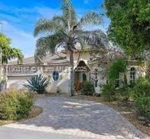 Photo of 950 Greensward Ln, Delray Beach, FL 33445 (MLS # A11903167) Photo of 950 Greensward Ln, Delray Beach, FL 33445 (MLS # A11903167)