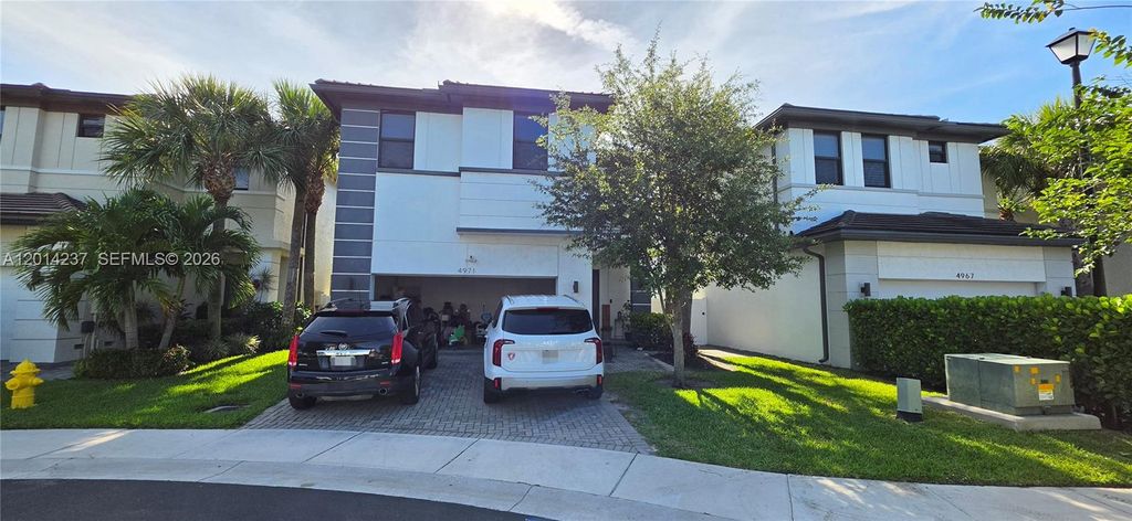 Photo of 4971 Whispering Way #4971, Fort Lauderdale, FL 33312 (MLS # A12014237)