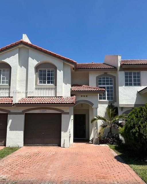 Cozy 3 bedrooms / 2.5 bathrooms townhouse located in the Doral Landings Townhomes neighborhood in the heart of Doral, a family-friendly area known for its proximity to good schools, restaurants, and shopping this is a gated community with pool, house has recently remodeled with new laminate floors, spacious closets, fenced patio, one car garage plus 2 front parking spaces. Ask for showing it!