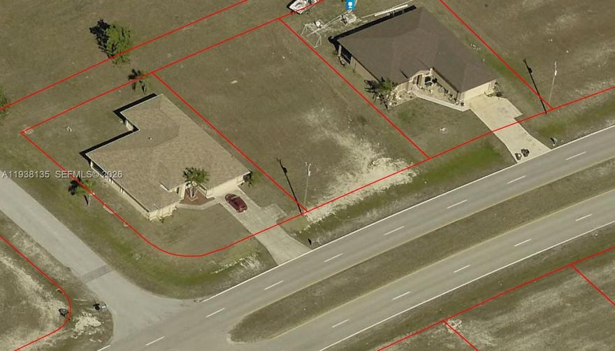 Lot on Diplomat Av between two fully constructed homes. Quick east - west access. Motivated owner.