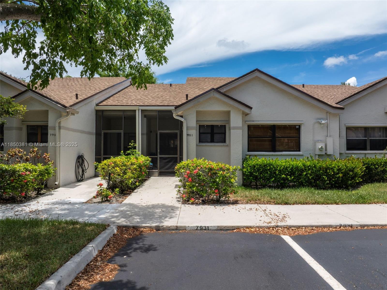 Spacious 2BD/2BA villa in Alpine Woods of Jacaranda with 1,282 sqft under A/C and 1,340 total. Roof replaced in 2023, HVAC in 2022. Tile floors in living areas, luxury vinyl plank in bedrooms. Primary suite includes a renovated en-suite bath with updated vanity and upgraded closet. Screened patios in both front and back, plus a large shared backyard perfect for pets. In-unit washer/dryer, new gutters, termite bond, and 2 assigned parking spaces with guest parking. Community offers a pool and well-maintained grounds. Centrally located near Tower Shops, Westside Regional, Broward Mall, and Plantation Walk. Move-in ready!
