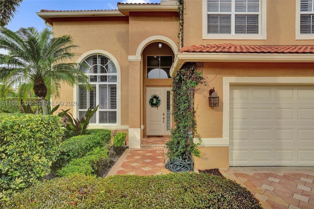 Photo of 7526 Colony Palm Dr, Boynton Beach, FL 33436 (MLS # A11951206)