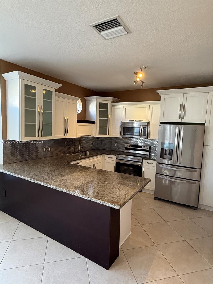 Rental Property at 4435 Sw 160th Ave 102, Miramar, Broward County, Florida - Bedrooms: 3 
Bathrooms: 2  - $2,900 MO.
